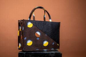 sac bi matière noir, marron et jaune.