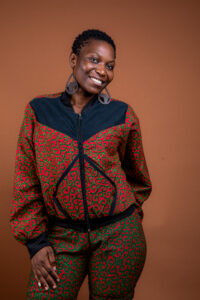 Veste bombers en wax noir et motifs rouge et vert